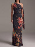 Abito maxi nero monospalla in chiffon plissettato a stampa