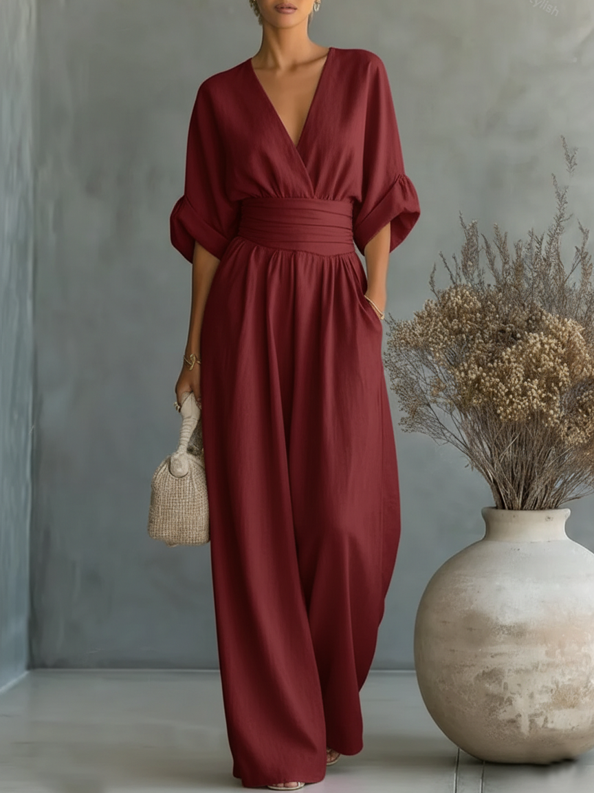 Elegante tuta a vita alta con scollo a V • S1