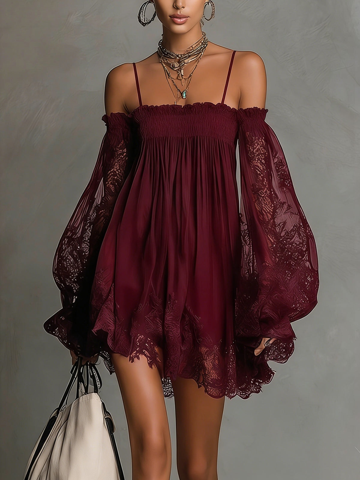 Noemi | Mini abito in chiffon blu navy con scollo a spalle scoperte, bordo in pizzo e maniche trasparenti