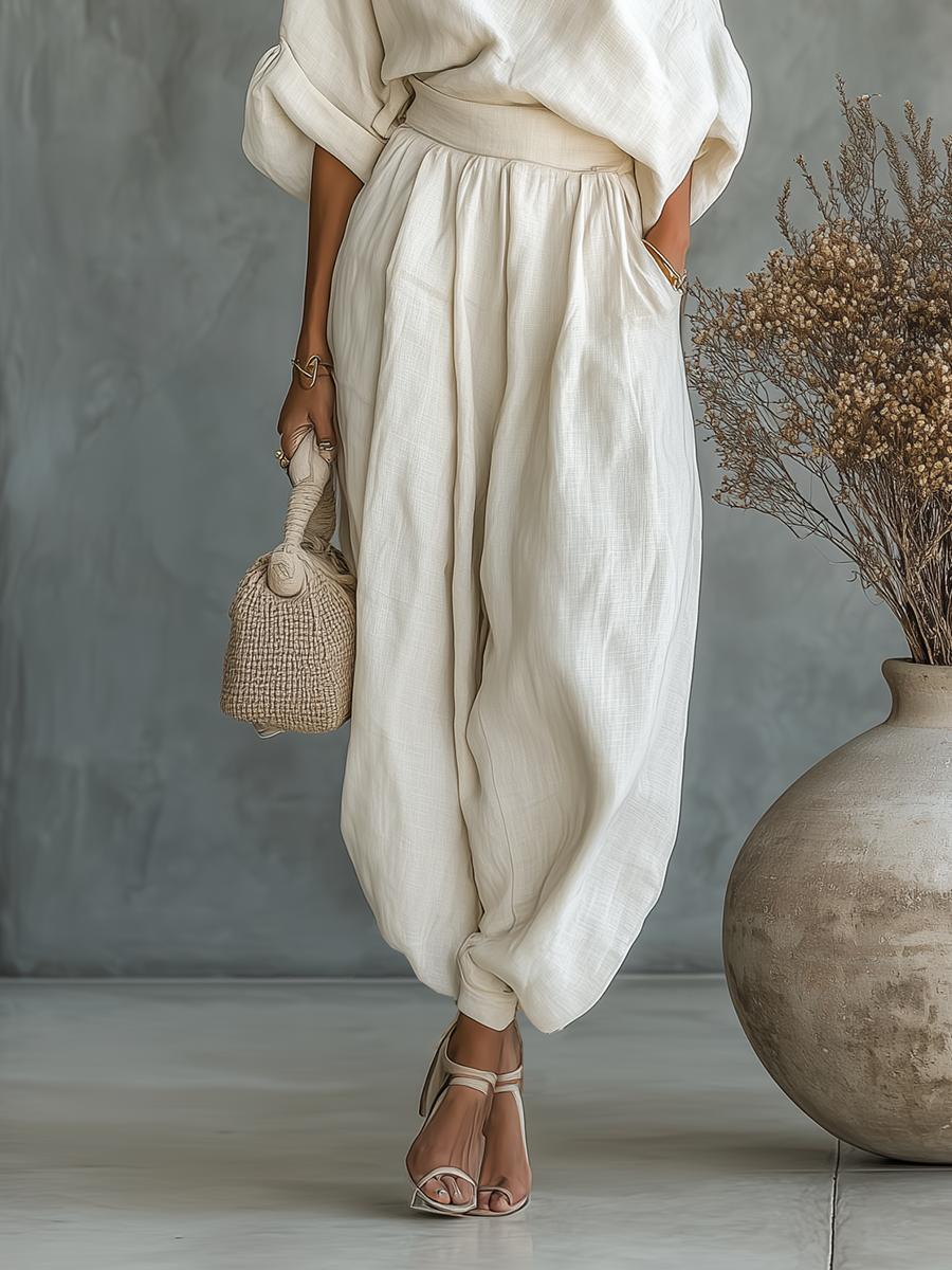 Set donna in lino bianco panna con top a spalle scoperte e pantaloni affusolati • S1