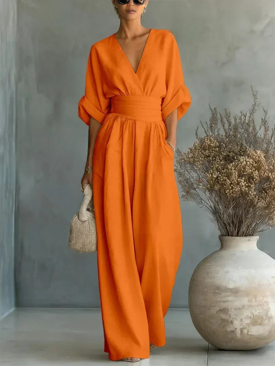 Elegante tuta a vita alta con scollo a V • S1