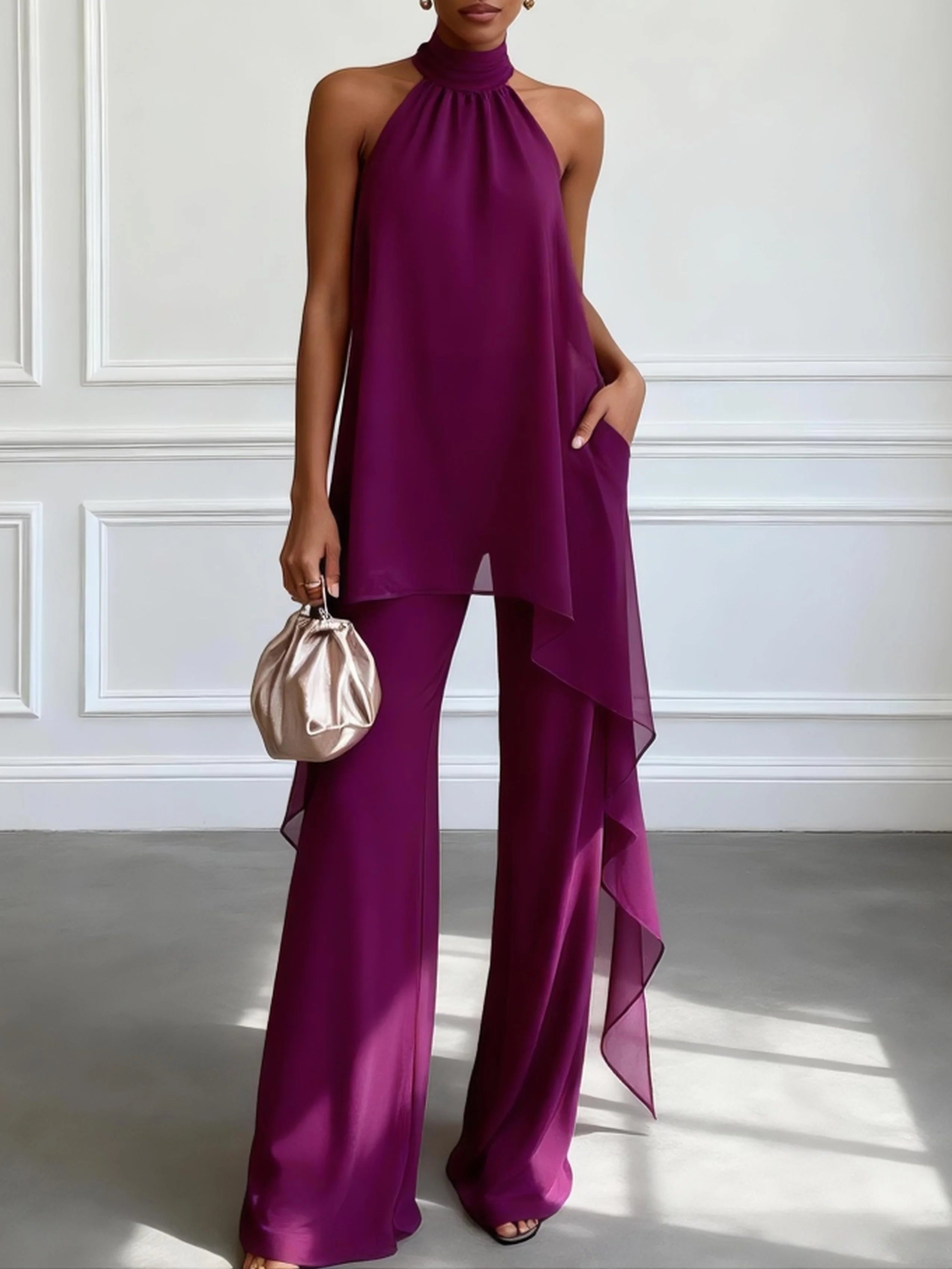 Set due pezzi viola con elegante top monospalla senza maniche e pantaloni