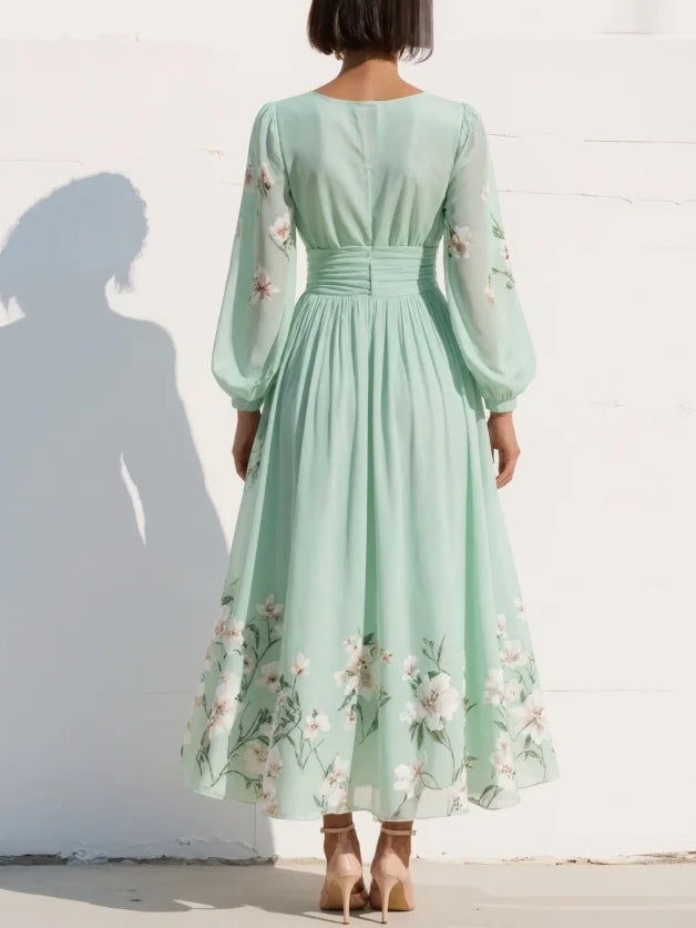 Abito maxi plissettato in chiffon verde menta con stampa floreale da donna