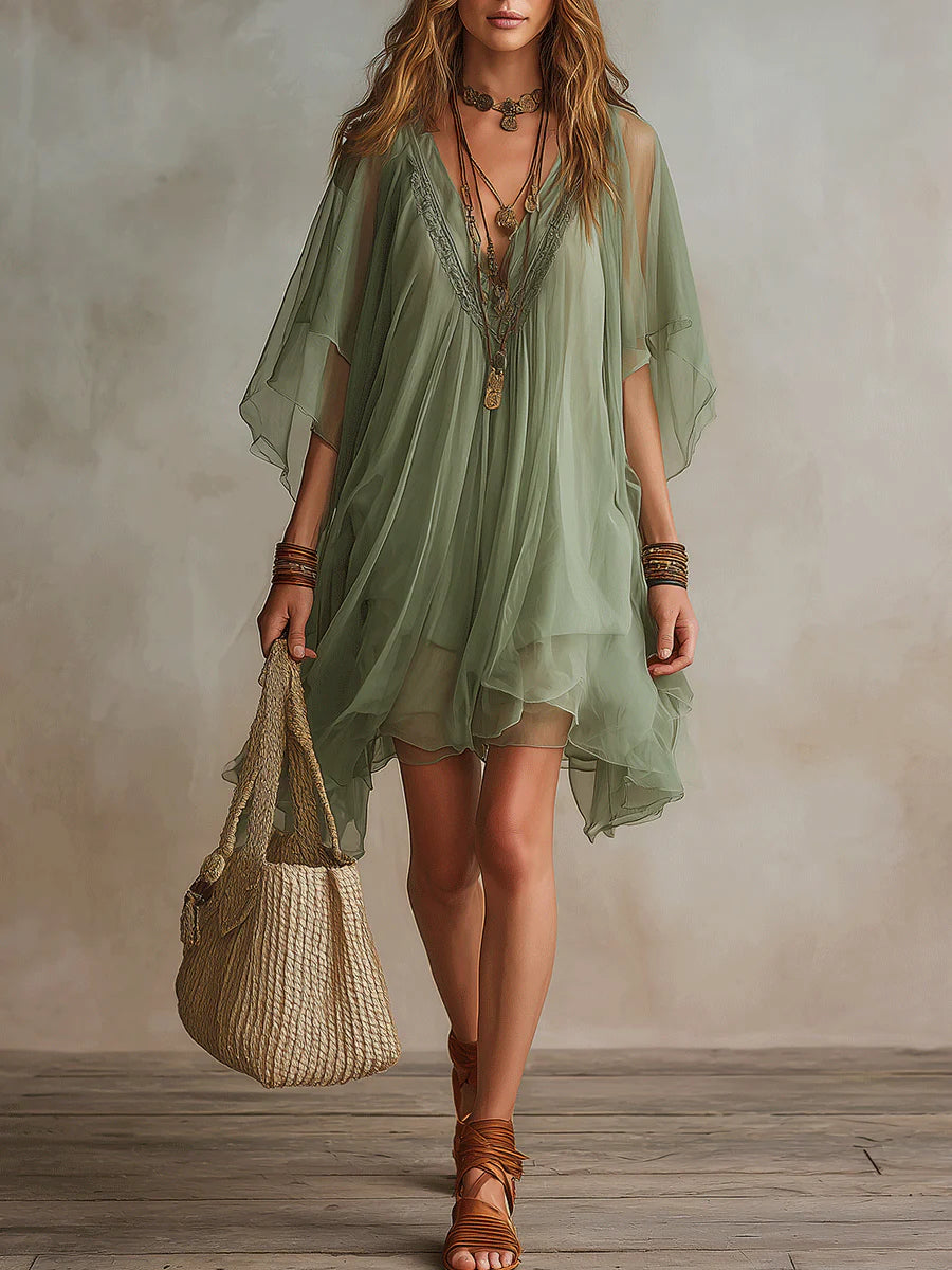 Mini abito verde in chiffon con scollo a V e strati fluidi