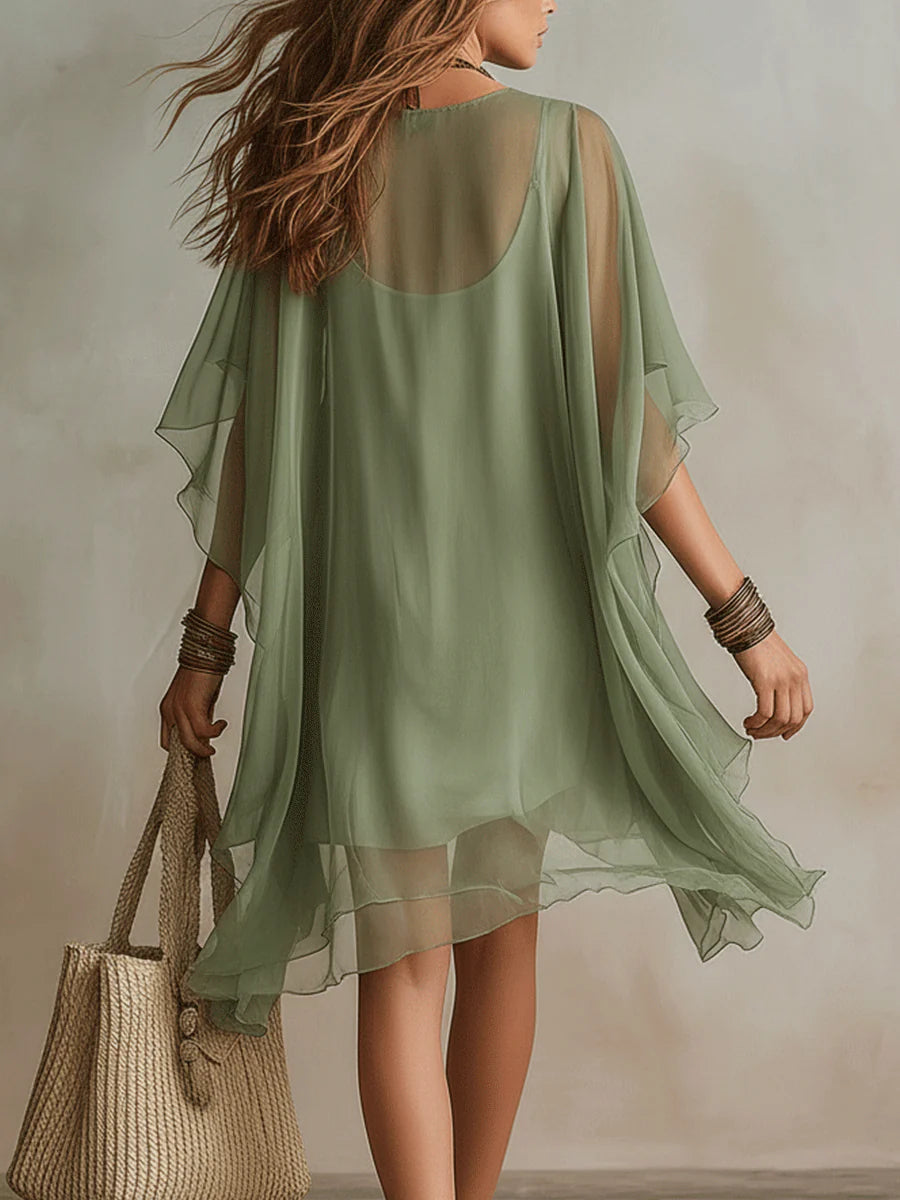Mini abito verde in chiffon con scollo a V e strati fluidi