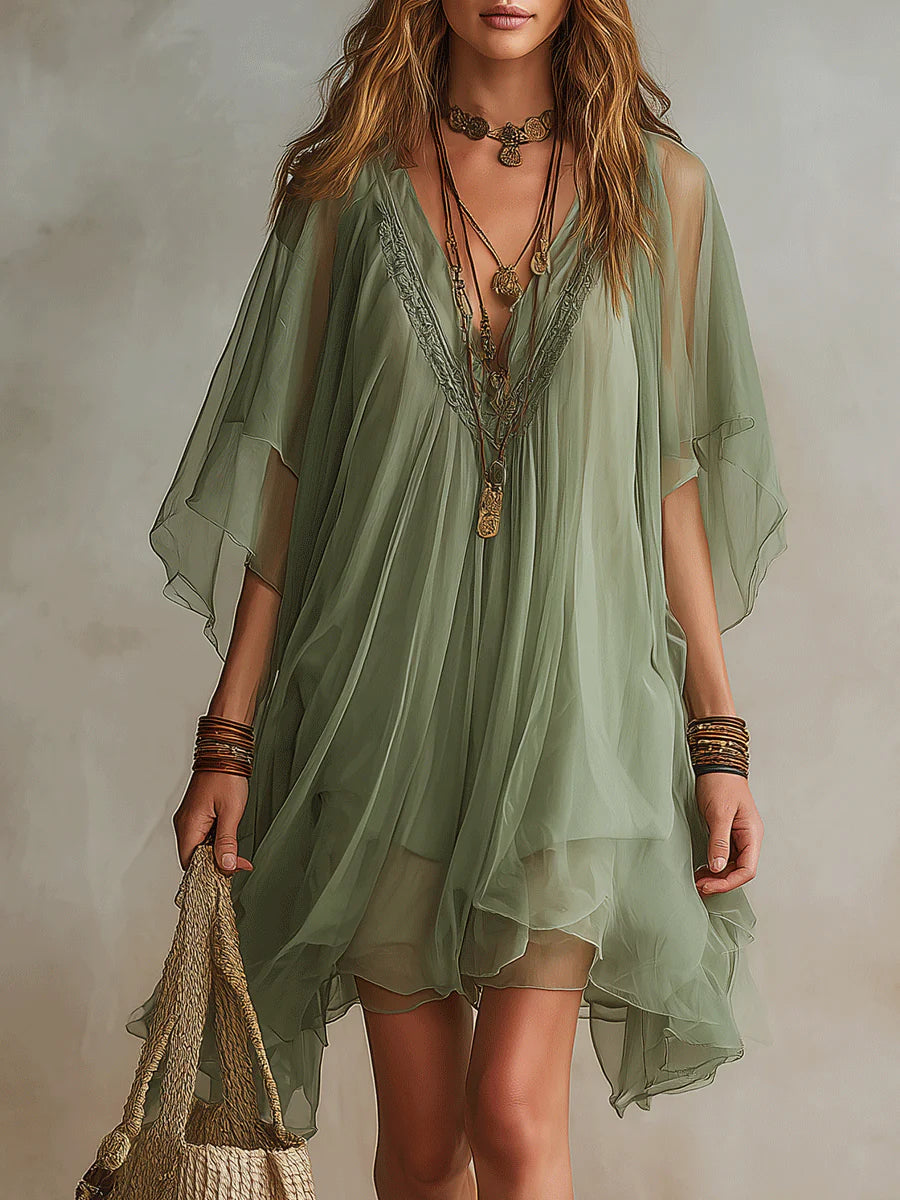 Mini abito verde in chiffon con scollo a V e strati fluidi
