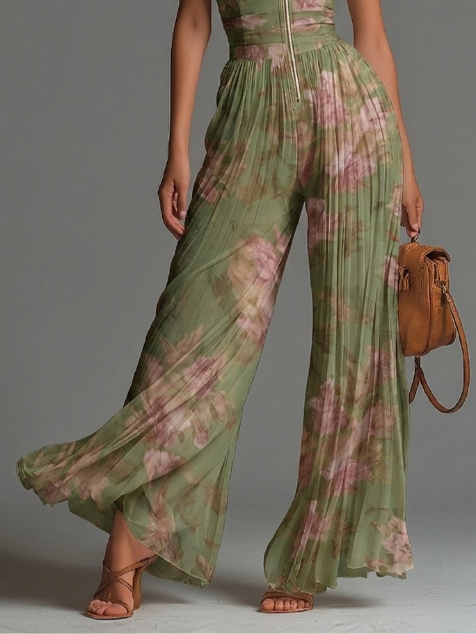 Tuta in chiffon verde a fiori con scollo a V, senza maniche, zip e pieghe a gamba larga