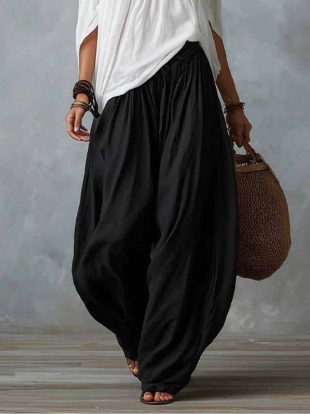 Set bianco con top a spalle scoperte e pantaloni lantern morbidi