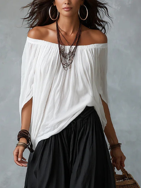 Set bianco con top a spalle scoperte e pantaloni lantern morbidi