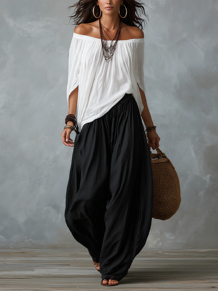 Set bianco con top a spalle scoperte e pantaloni lantern morbidi