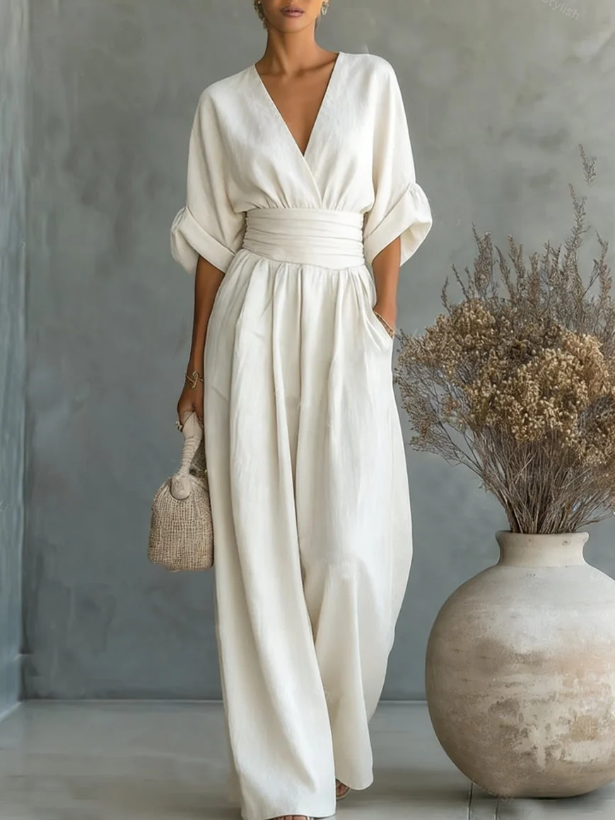 Elegante tuta a vita alta con scollo a V • S1