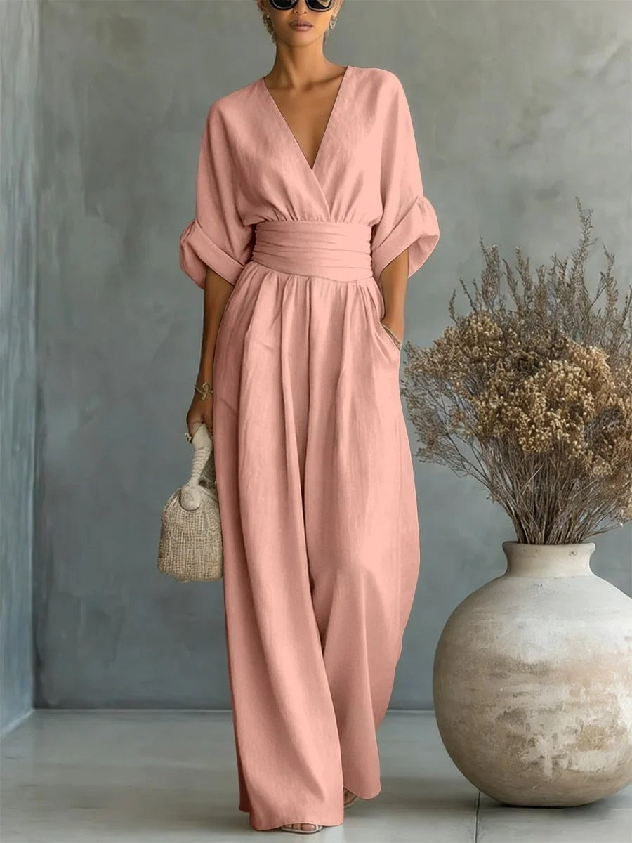 Elegante tuta a vita alta con scollo a V • S1